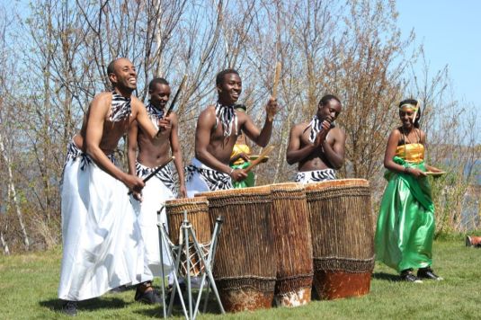 Abeza B'inganzo bringing their infectious smiles and powerful rhythms. Photo by Jessica Townsend